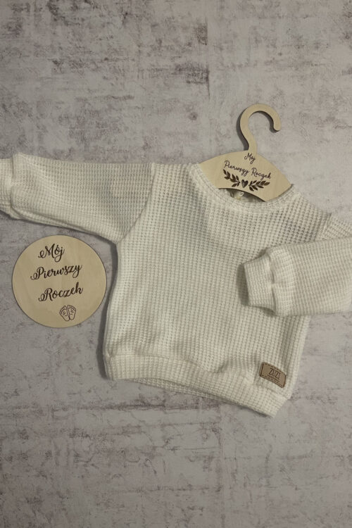 Kremowy sweterek z kokardką